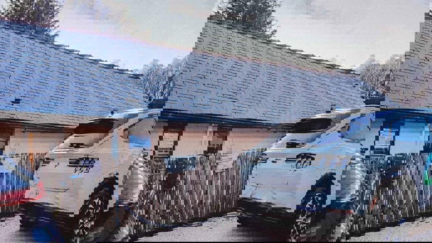 Shot of the Clenergy EV company vehicle (Nissan Leaf) charging at our MD's home EV charging device.