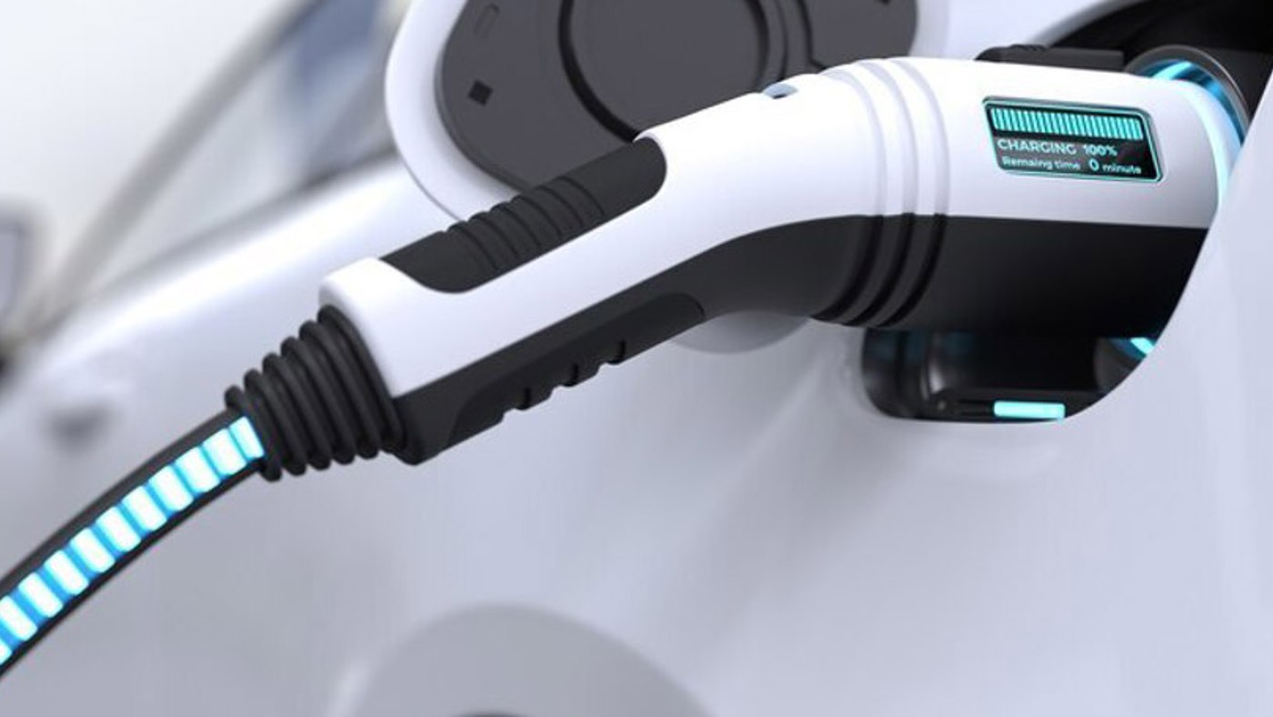 An electric car charging via an OCPP EV charger, a testament to the efficiency of OCPP software.