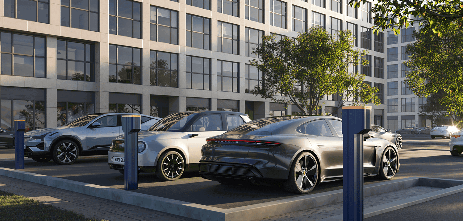 EVs parked alongside EV chargepoints outside a work office