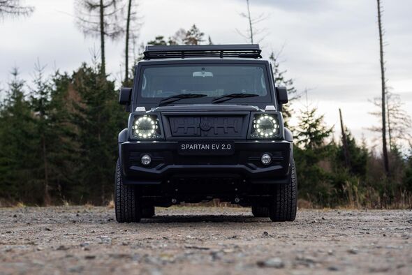 An image of a matte black Spartan 2.0 Electric SUV from MW motors