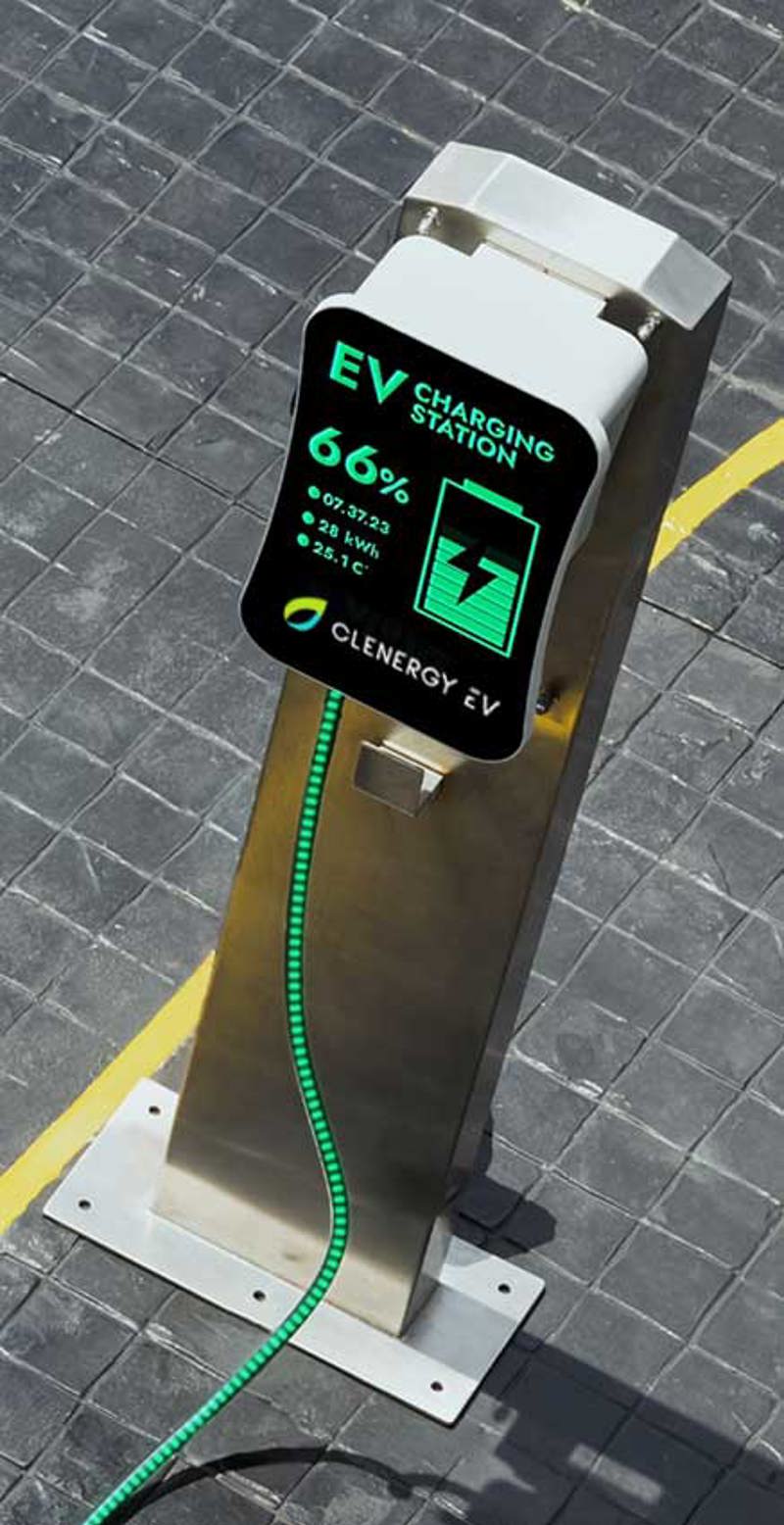Futuristic EV charger against a leather seat backdrop with the words 'Make software your hero'