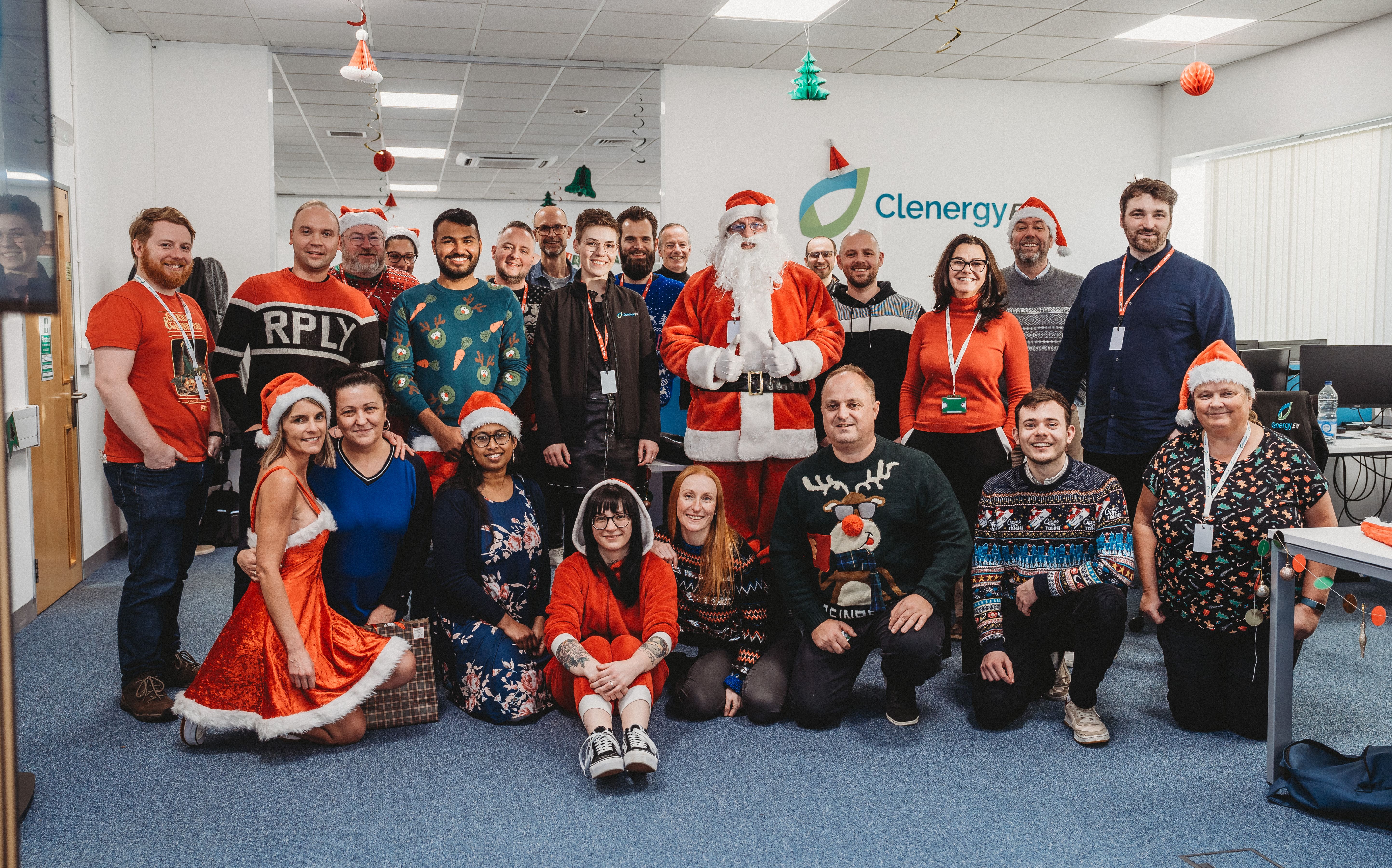 Santa and team in Clenergy EV office